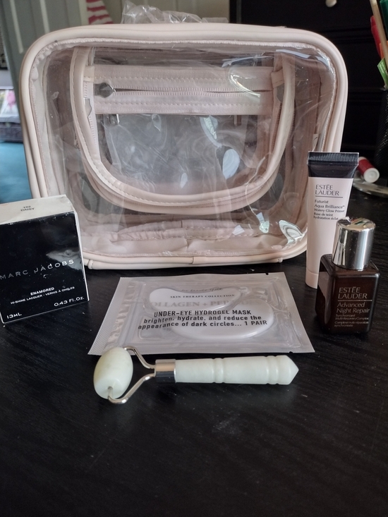 Estee Lauder Handbags - Estee Lauder Pink Clear Travel Cosmetic Bag with Skincare Set